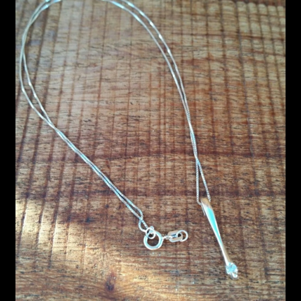 14K WHITE GOLD PENDANT W/WHITE STONE